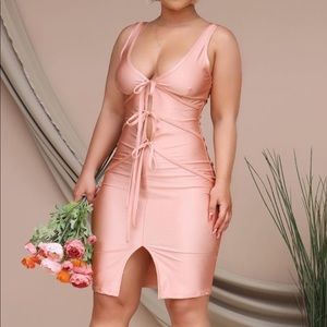 Gorgeous pink dress with ties in the front size small NWT